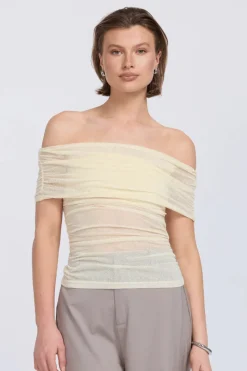 Sovere Studio SOVERE / STUDIO - RISE MESH SLEEVELESS TOP (BUTTERMILK)