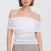Sovere Studio SOVERE / STUDIO - RISE MESH SLEEVELESS TOP (CHALK)