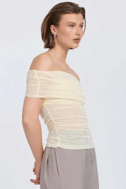 Sovere Studio SOVERE / STUDIO - RISE MESH SLEEVELESS TOP (BUTTERMILK)